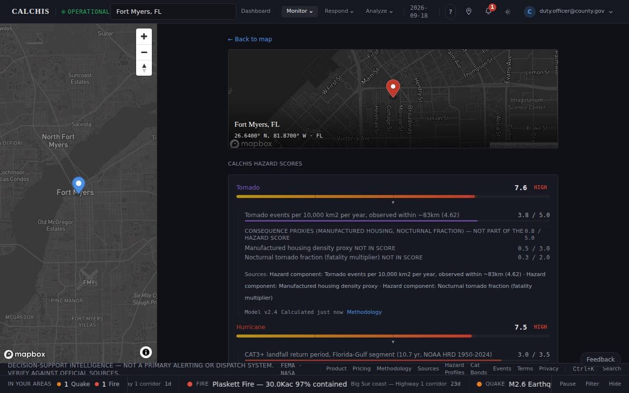 An address looked up: the map narrowed to a pane with a pin, and the hazard scores for the address beside it.